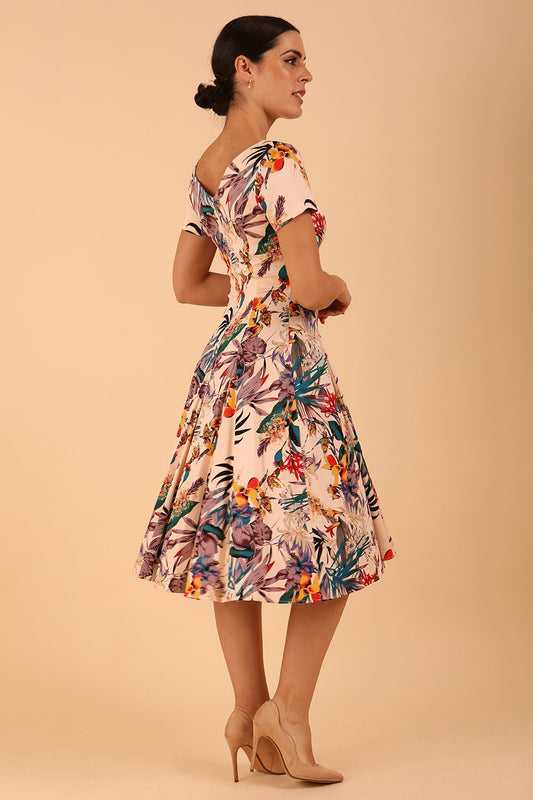 Model wearing a diva catwalk Iris Print Dress short sleeve swing skirt in Rainforest print front