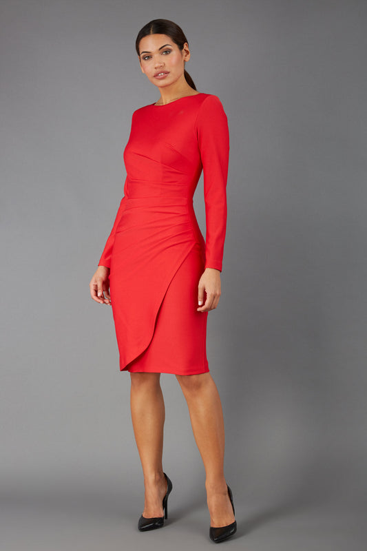 brunette model wearing diva catwalk pencil skirt dress sleeved with pleating on side in electric red colour front (Electric Red)