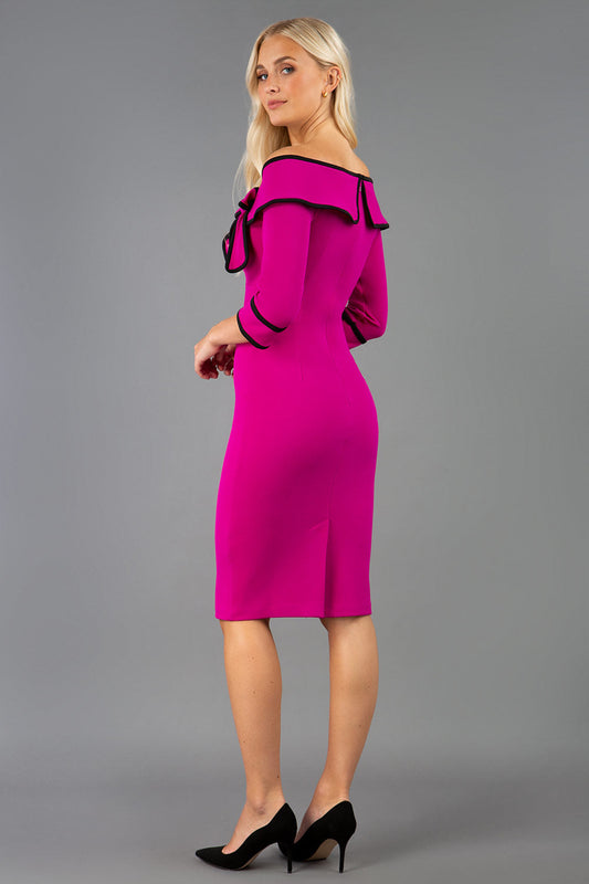 A Model is wearing an off shoulder three quarter sleeve pencil dress in pink by diva catwalk back image
