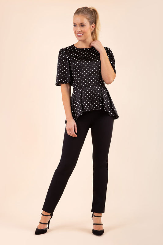 blonde model wearing diva catwalk straight ankle length trousers in black front