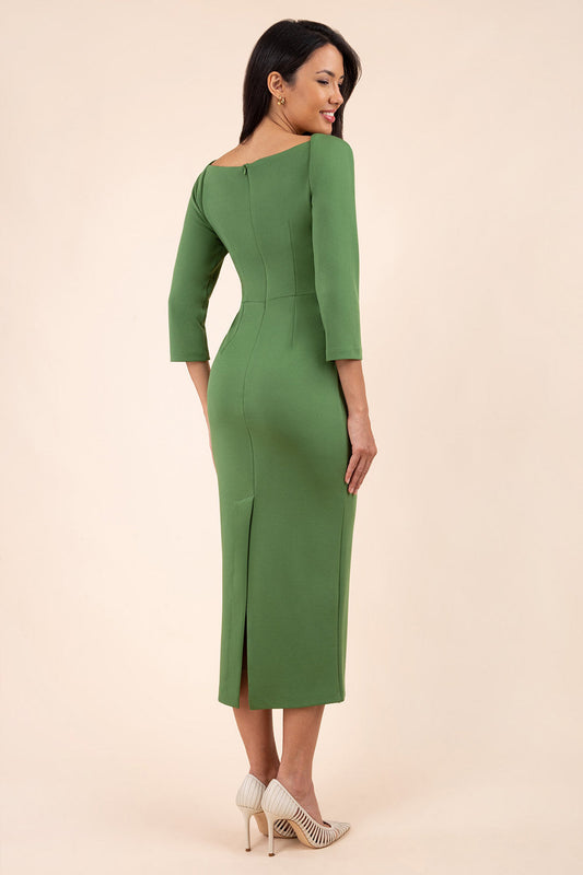brunette model wearing diva catwalk maxi plain three quarter sleeve dress with pleating on shoulders and square neckline in vineyard green front