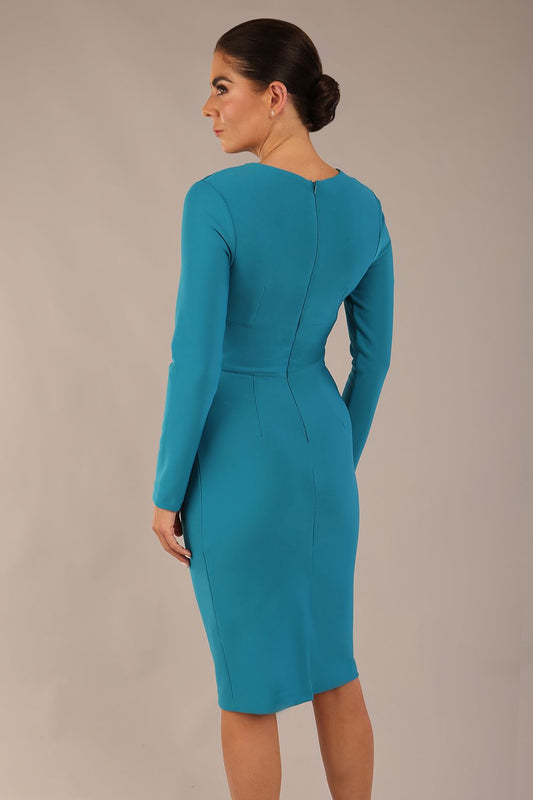 model wearing a diva catwalk Olgivy Long Sleeve Knee Length Pencil Dress round neckline and long sleeve in magic blue colour front