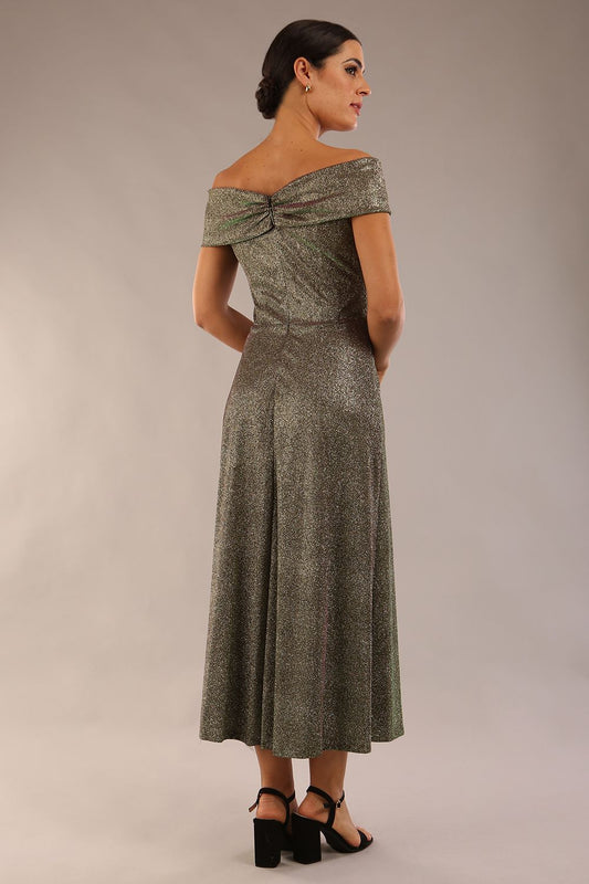 Model is wearing a diva catwalk Capri A-Line Midaxi Glitter Dress in Sherwood Glitter Gold front