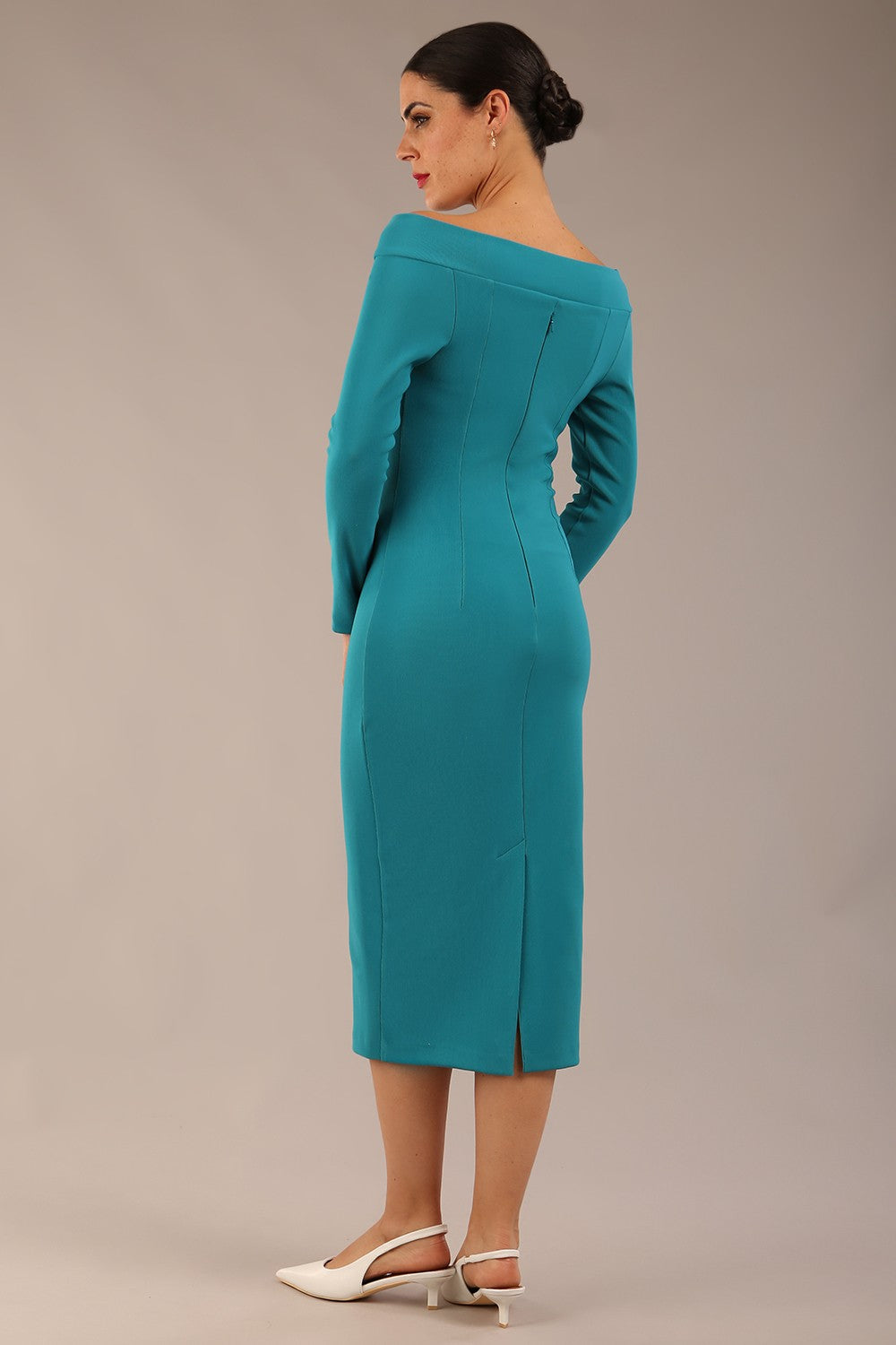 brunette Model is wearing a DIVA Catwalk Faye Off Shoulder Long Sleeve Midi Pencil Dress in Mosaic Blue colour front image