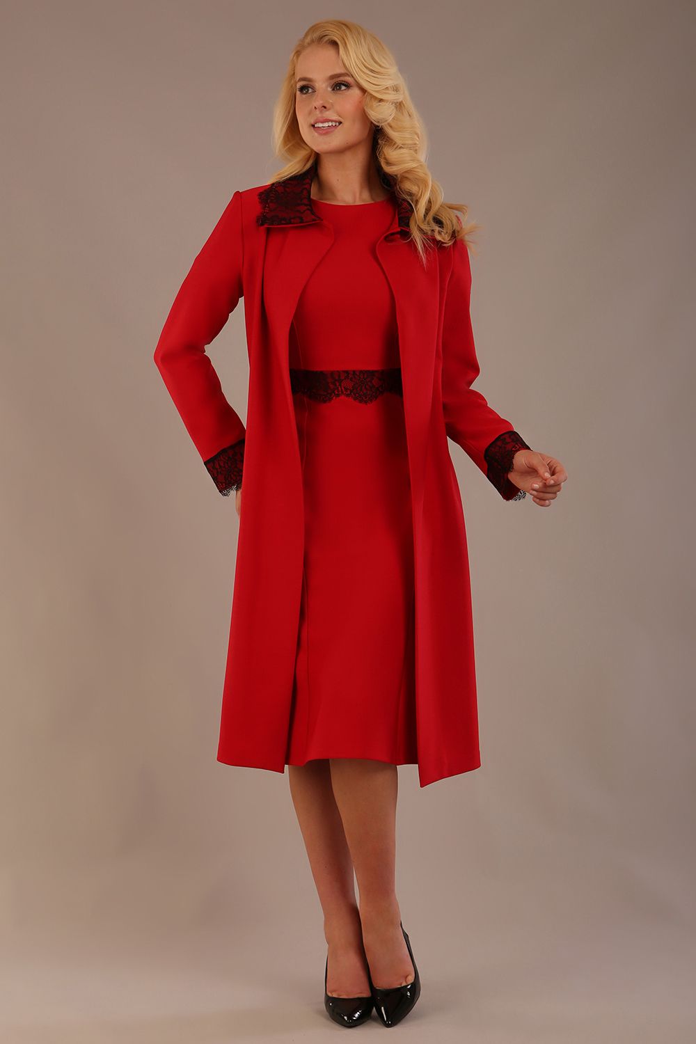 Model wearing the Haven lace trim midi coat in salsa red, styled with the matching Lovell dress (Salsa Red)