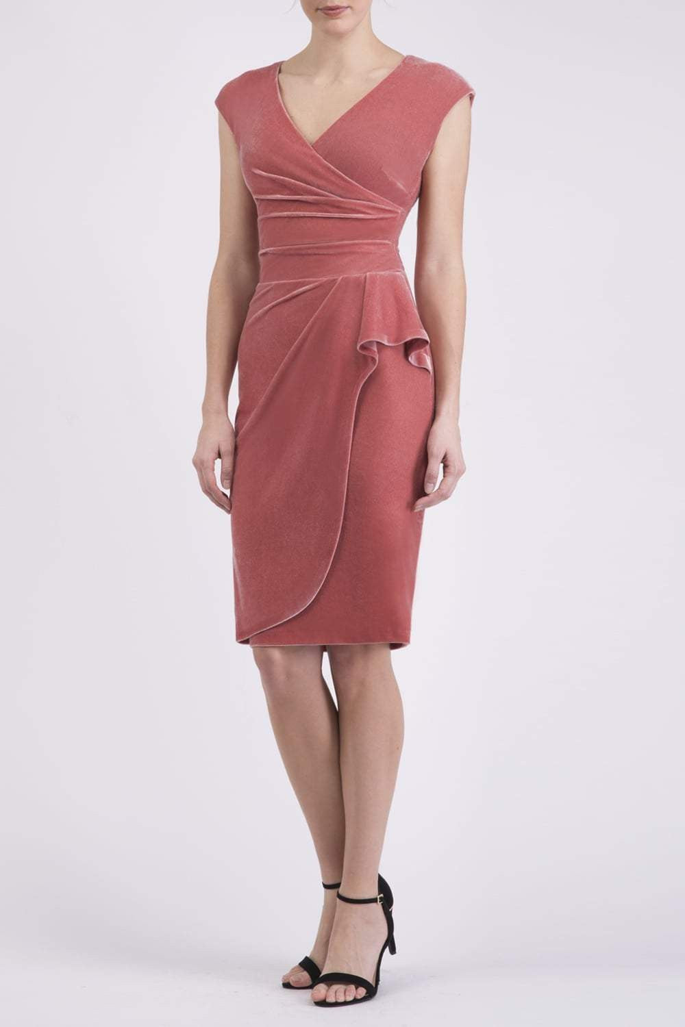 brunette model is wearing diva catwalk velvet pencil dress with V-neck and wrap skirt in mahogany pink front