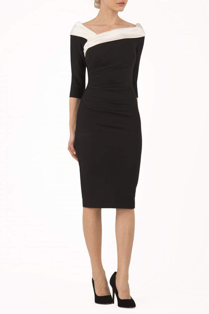 model is wearing diva catwalk pencil dress with contrasting asymmetric satin neckline in Gardenia front