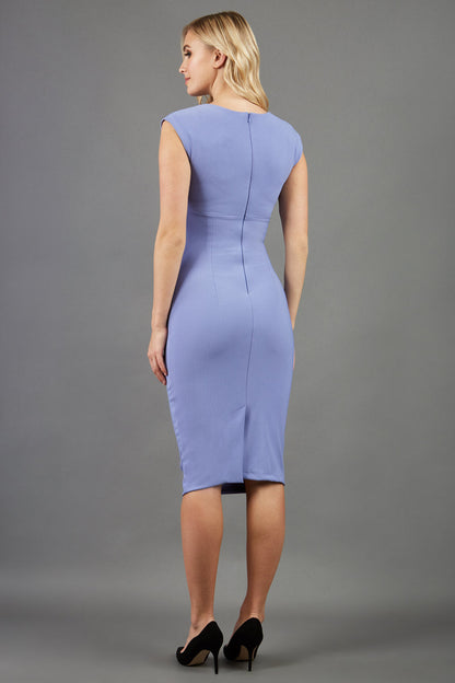brunette model wearing diva catwalk lydia sleeveless pencil flattering fitted plain dress with split neckline and pleating across the body vista blue front (Vista Blue)
