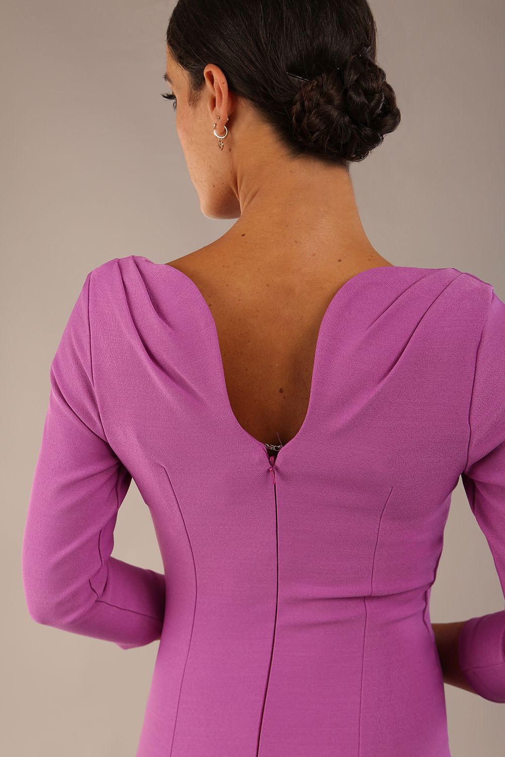 Model wearing the Seed Agatha in pencil dress design in magenta mist front image