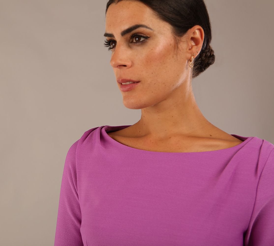 Model wearing the Seed Agatha in pencil dress design in magenta mist front image