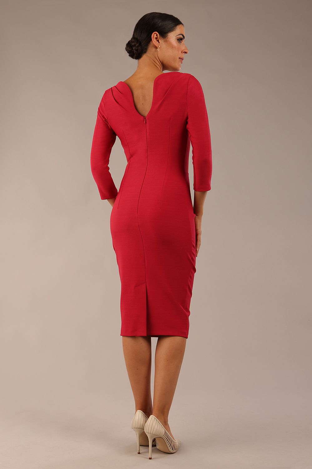 Model wearing the Seed Agatha in pencil dress design in crimson pink front image