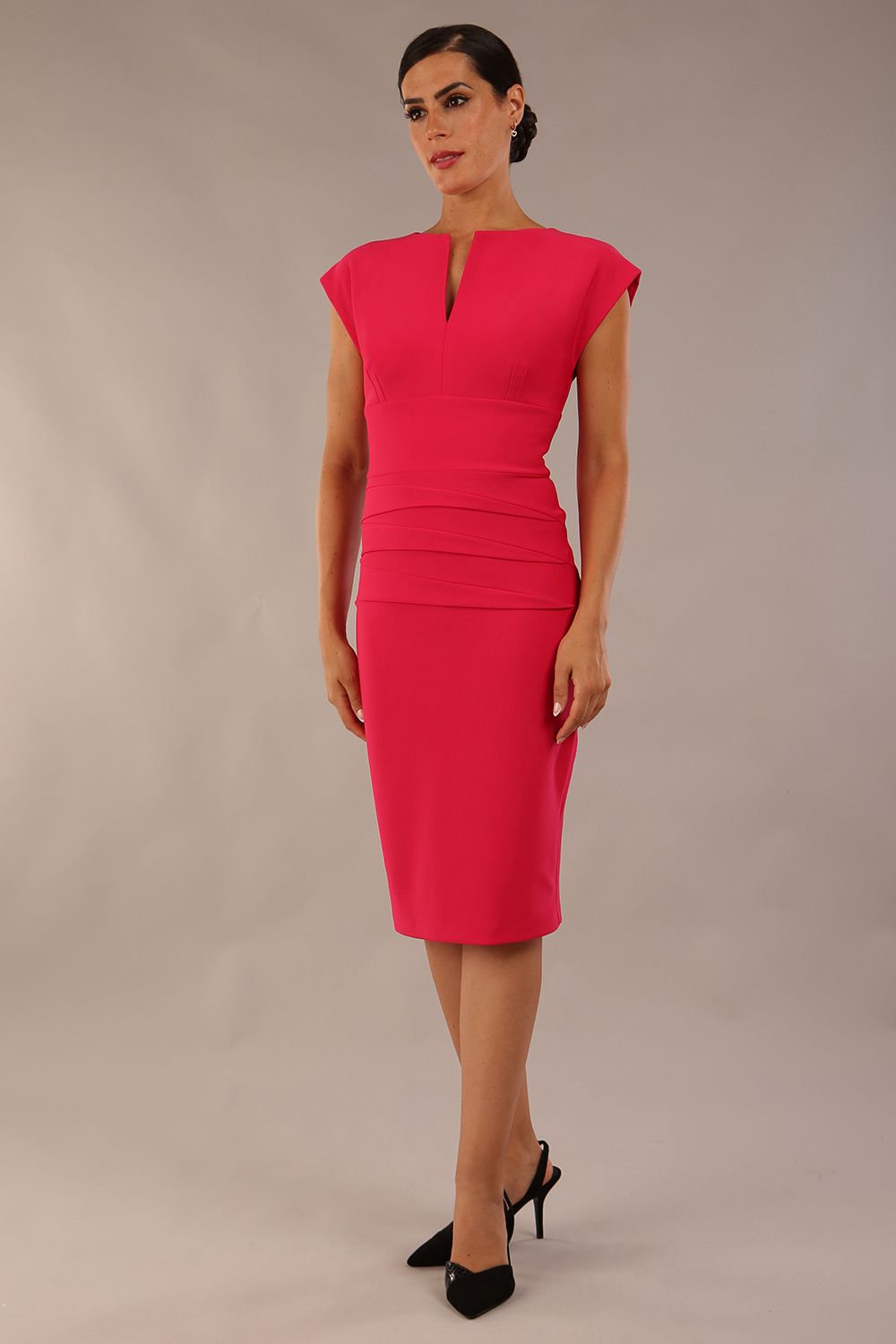 Model wearing the Diva Daphne Pencil with split neckline, sleeveless in yarrow pink front image 