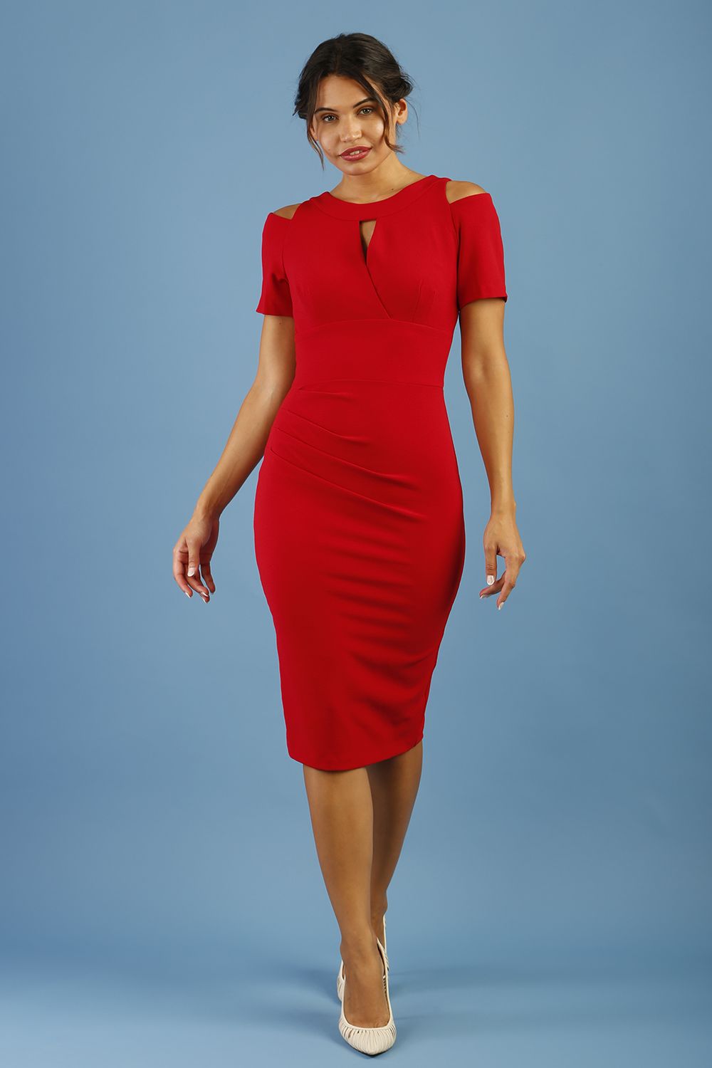 model wearing diva catwalk ruth pencil skirt dress with a keyhole cut in rounded neckline and cold shoulder detail in scarlet red colour front