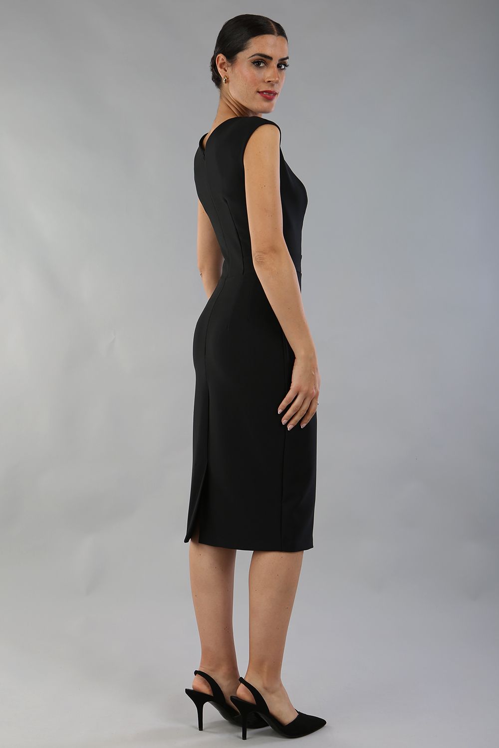model is wearing diva catwalk seed cadiz pencil sleeveless dress in black front