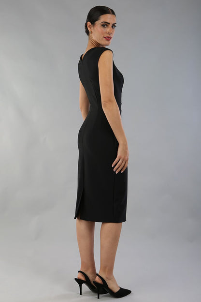 model is wearing diva catwalk seed cadiz pencil sleeveless dress in black front