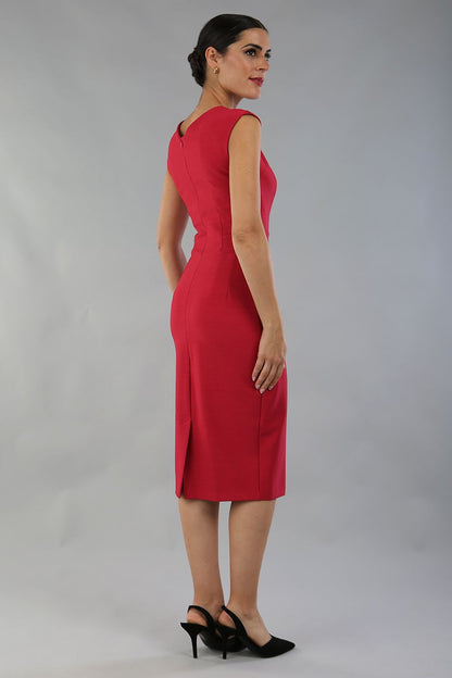 model is wearing diva catwalk seed cadiz pencil sleeveless dress in crimson pink front close up