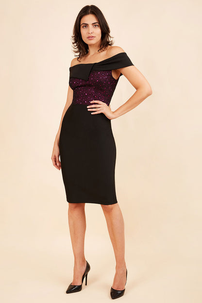 brunette model wearing diva catwalk marni fitted pencil skirt dress bardot neckline and contrasting bust area in pink and black front