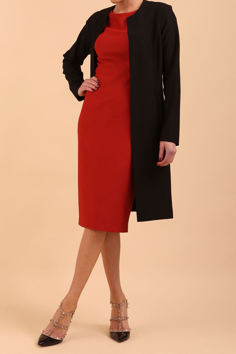 model wearing diva catwalk teal coat with long sleeves and a belt in Black front