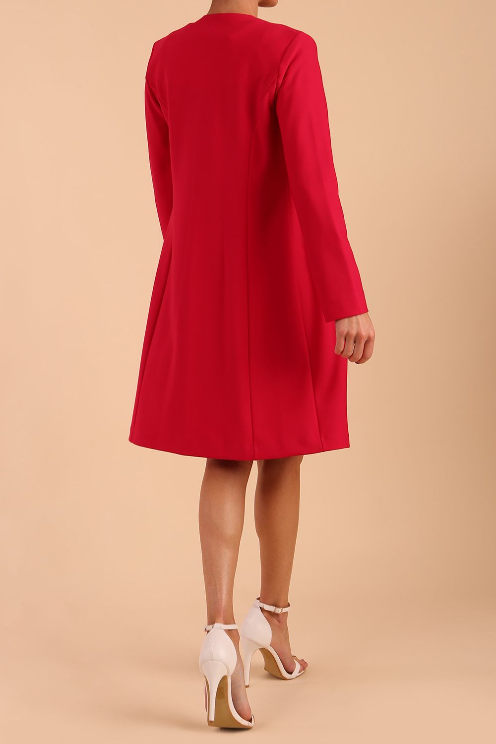 model wearing diva catwalk teal coat with long sleeves and a belt in Rose Red back
