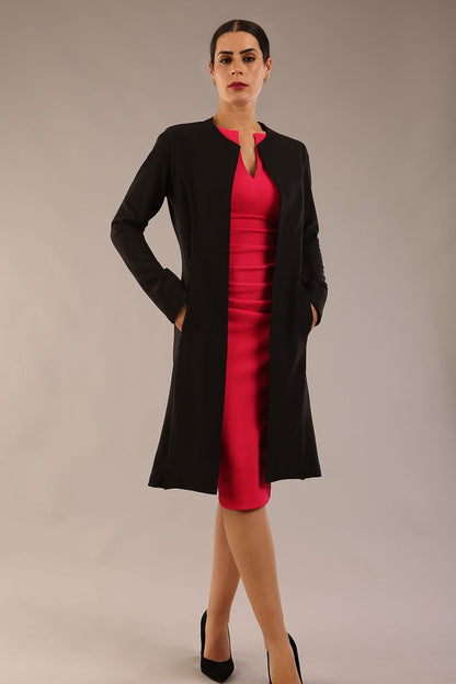 model wearing diva catwalk teal coat with long sleeves and a belt in Black back