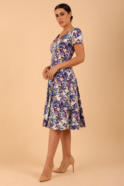 Model wearing a diva catwalk Iris Print Dress short sleeve swing skirt in Kew print front