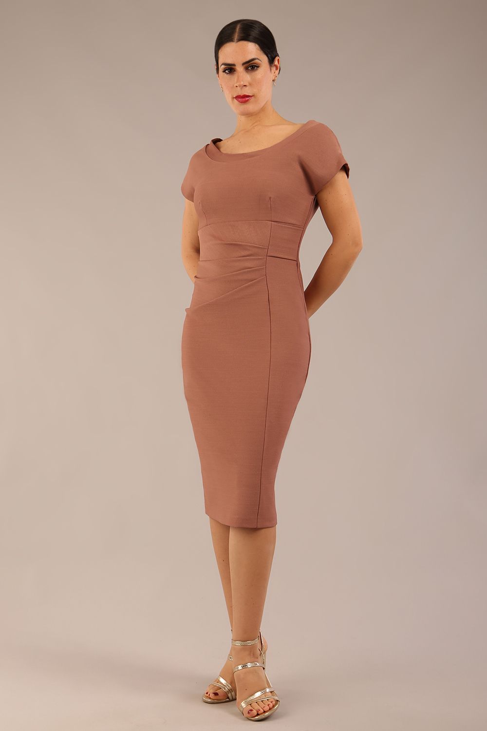 brunette model wearing a diva catwalk Seed Leela Rounded Neckline Cap Sleeved Pencil dress Dress in acorn brown colour front