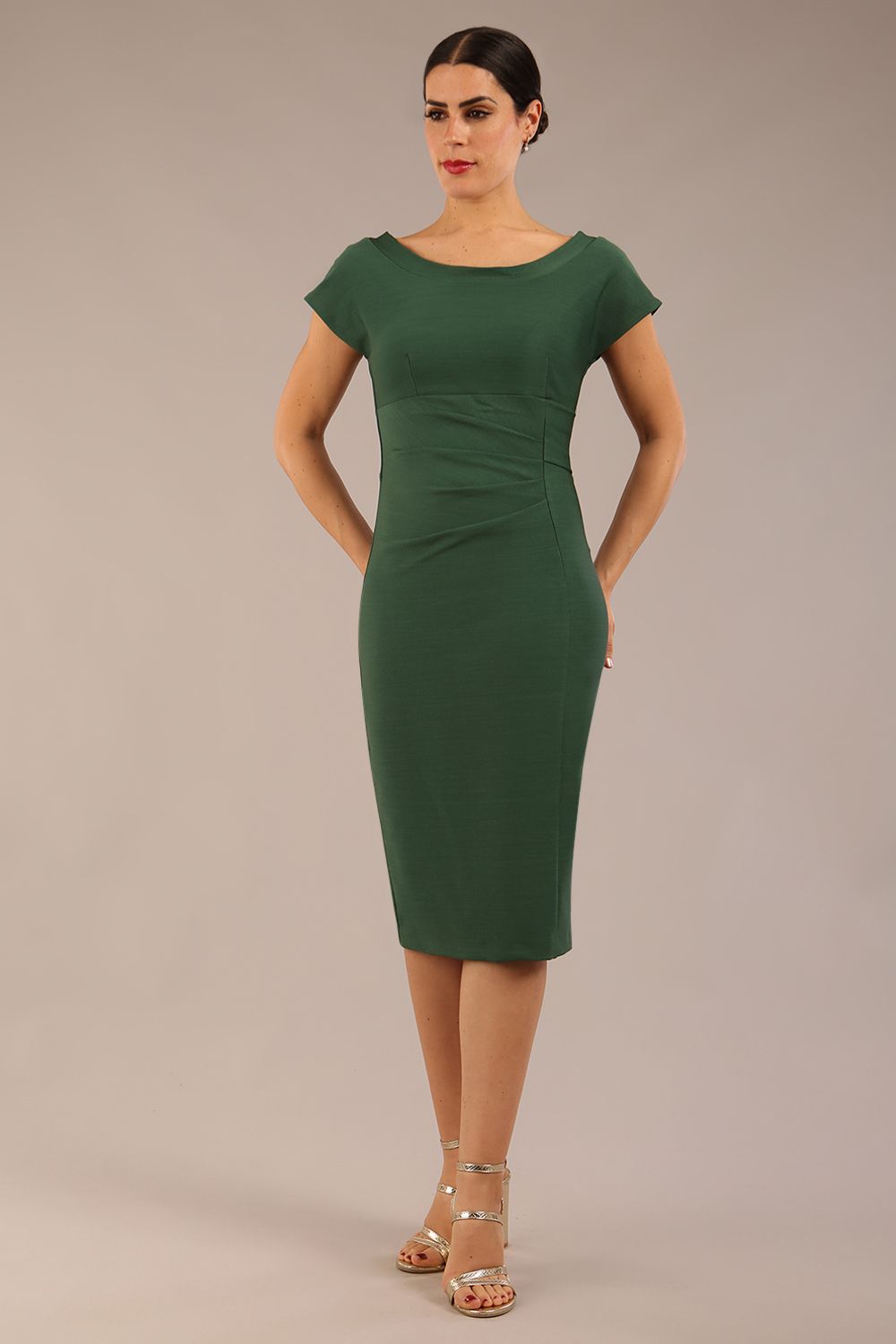 brunette model wearing a diva catwalk Seed Leela Rounded Neckline Cap Sleeved Pencil dress Dress in chrome green colour front side