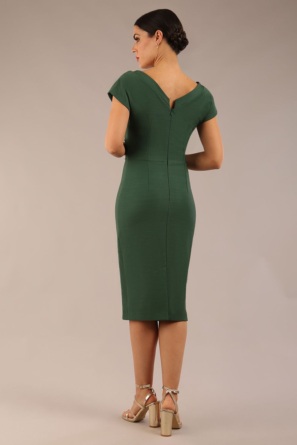 brunette model wearing a diva catwalk Seed Leela Rounded Neckline Cap Sleeved Pencil dress Dress in chrome green colour front side