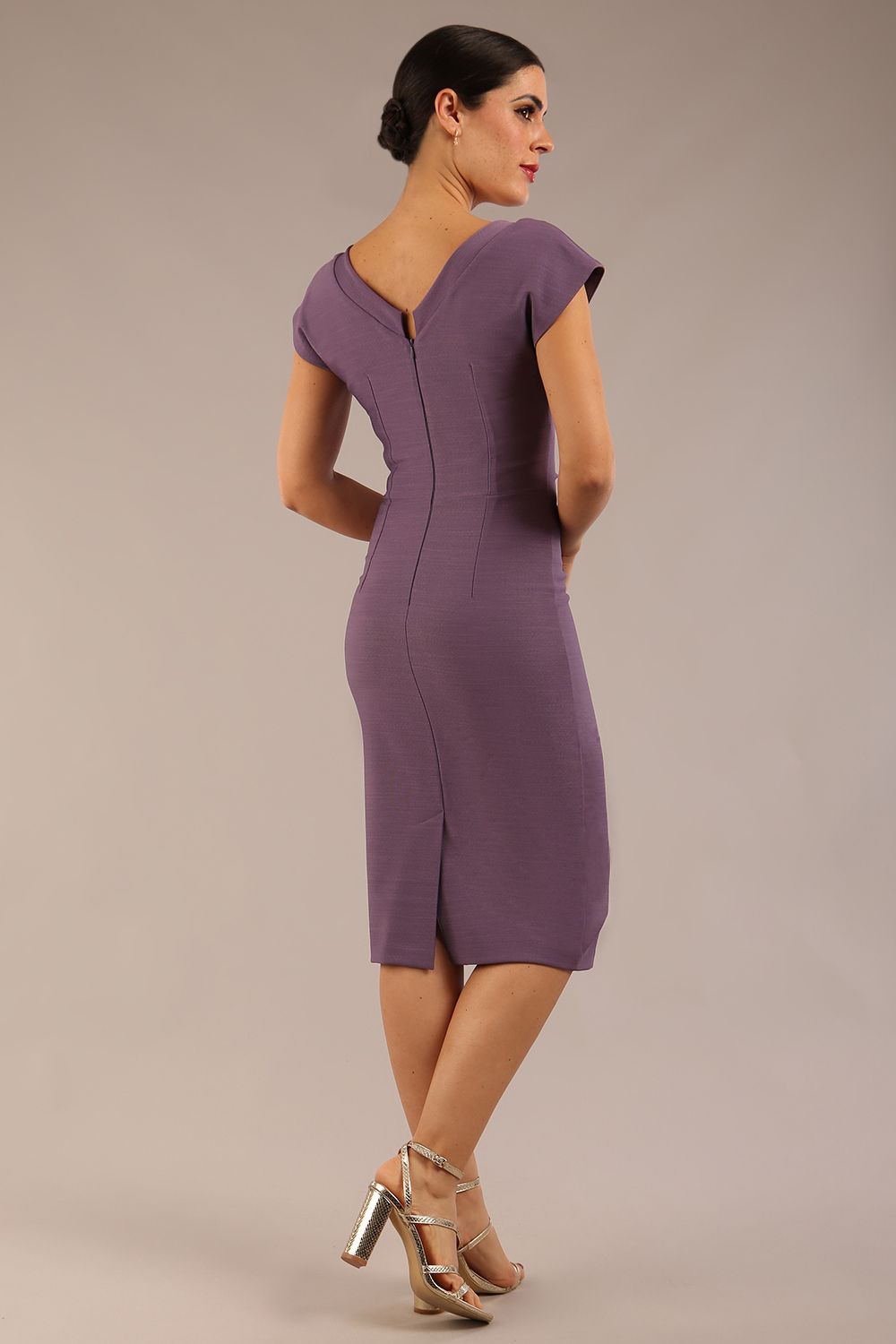 brunette model wearing a diva catwalk Seed Leela Rounded Neckline Cap Sleeved Pencil dress Dress in dusky lilac colour front