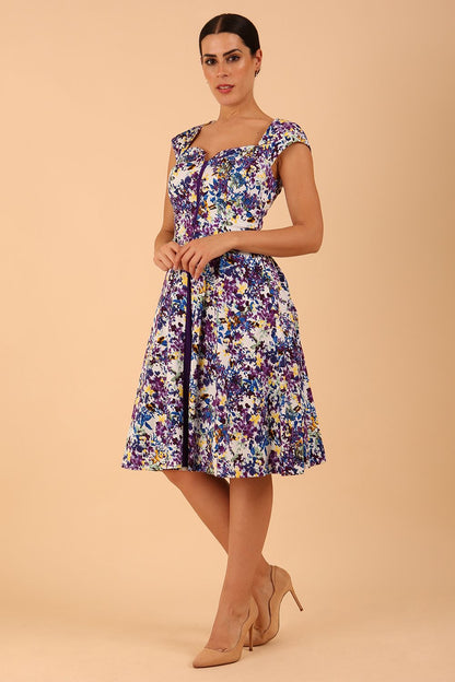 model wearing a diva catwalk Shayla Swing Dress sleeveless swing skirt dress in kew print colour front
