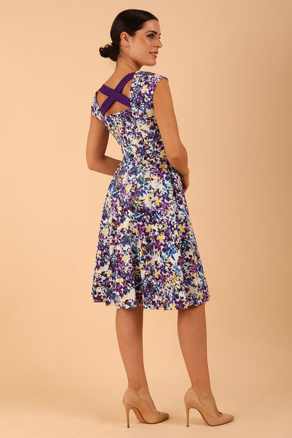 model wearing a diva catwalk Shayla Swing Dress sleeveless swing skirt dress in kew print colour front
