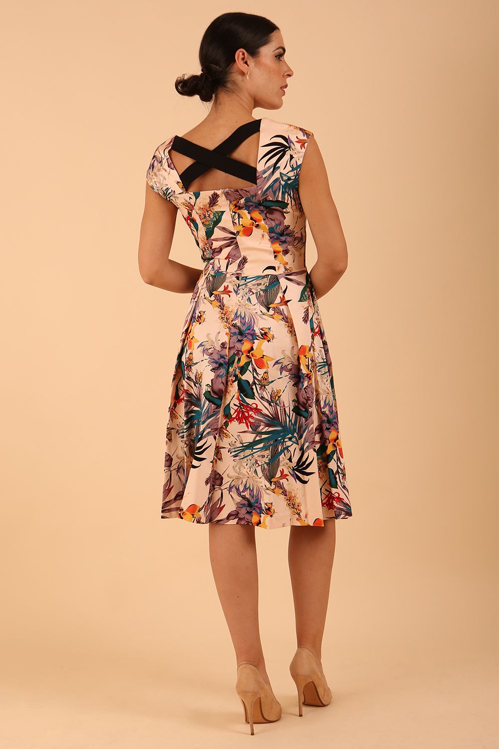 model wearing a diva catwalk Shayla Swing Dress sleeveless swing skirt dress in rainforest print colour front