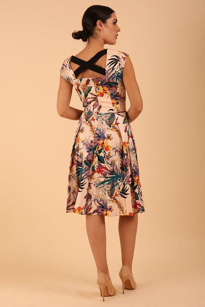 model wearing a diva catwalk Shayla Swing Dress sleeveless swing skirt dress in rainforest print colour front