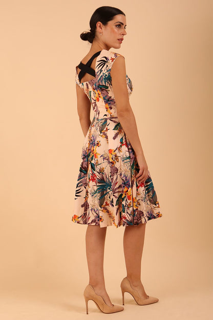 model wearing a diva catwalk Shayla Swing Dress sleeveless swing skirt dress in rainforest print colour front