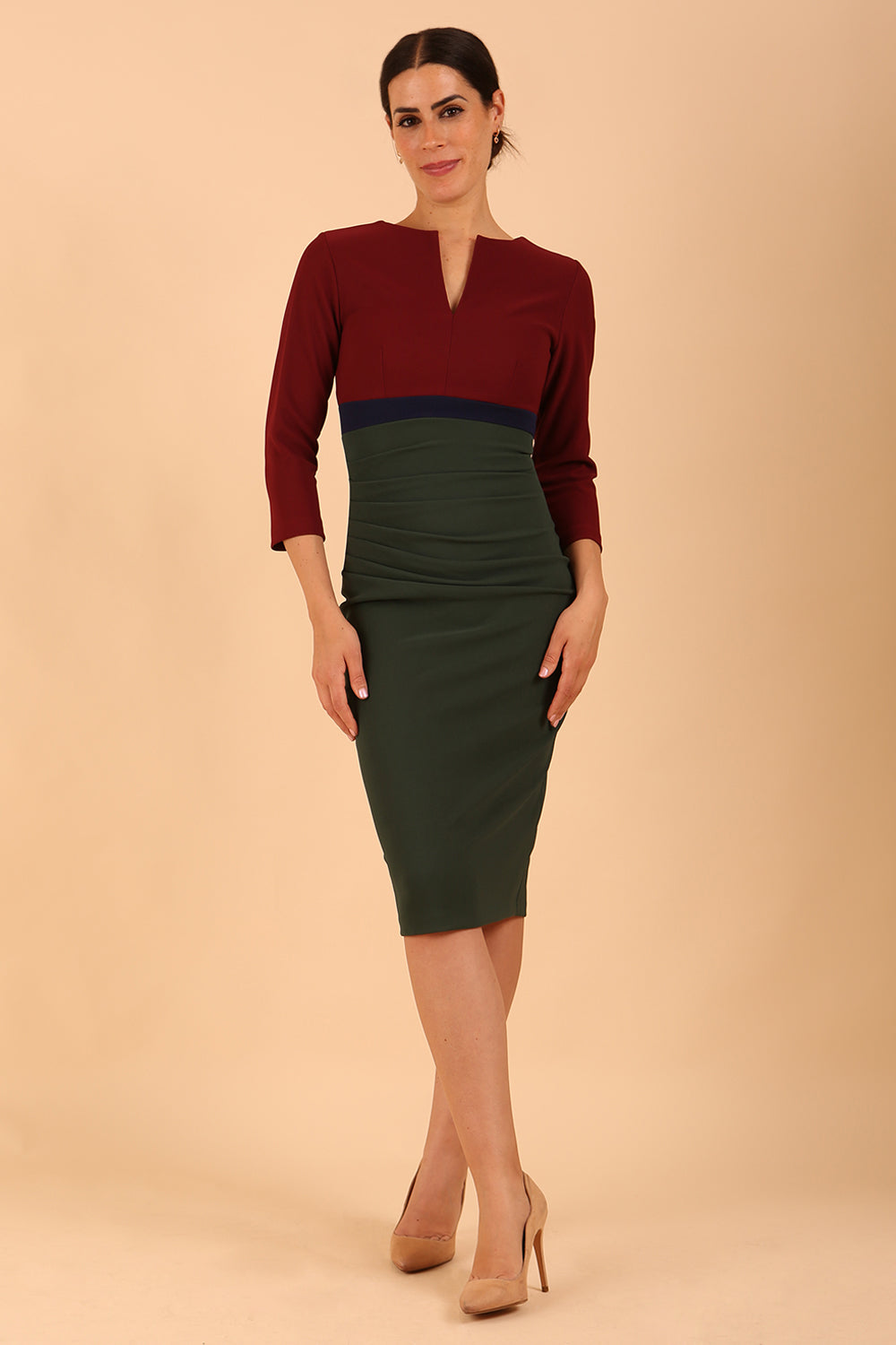 model wearing a diva catwalk Nadia 3/4 Sleeve Colour Block Dress 3/4 sleeve pencil dress exposed zip at the back in Deep Green + Burgundy + Navy Blue colour front