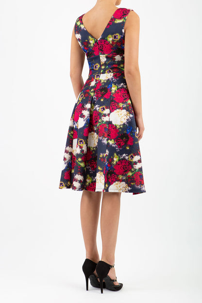 model wearing the Aldeburgh Print swing Dress with v-neck short sleeve front image