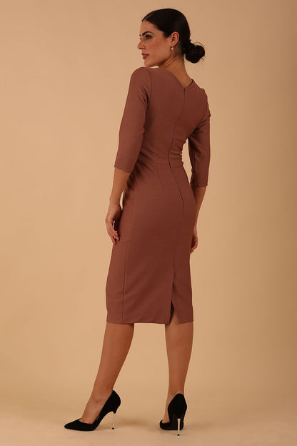 Model wearing diva catwalk Seed Divine Dress 3/4 sleeved knee length in acorn brown colour