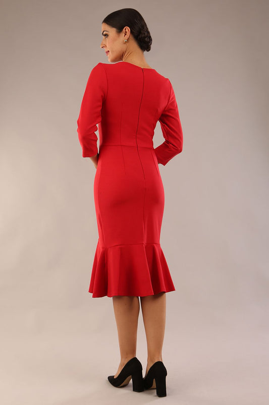 model is wearing a diva catwalk Seed Brecon Fishtail Sleeved Dress in salsa red colour side front