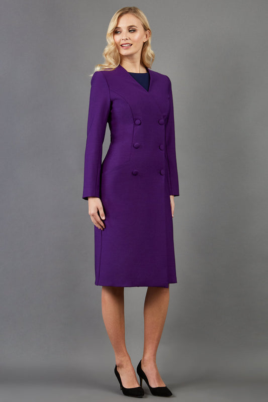 blonde model wearing the Diva Silverstone Coat with V neckline in imperial purple front image