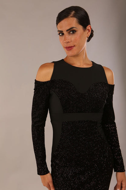 blonde model is wearing diva catwalk partyon glitter pencil dress with cold shoulder in black front