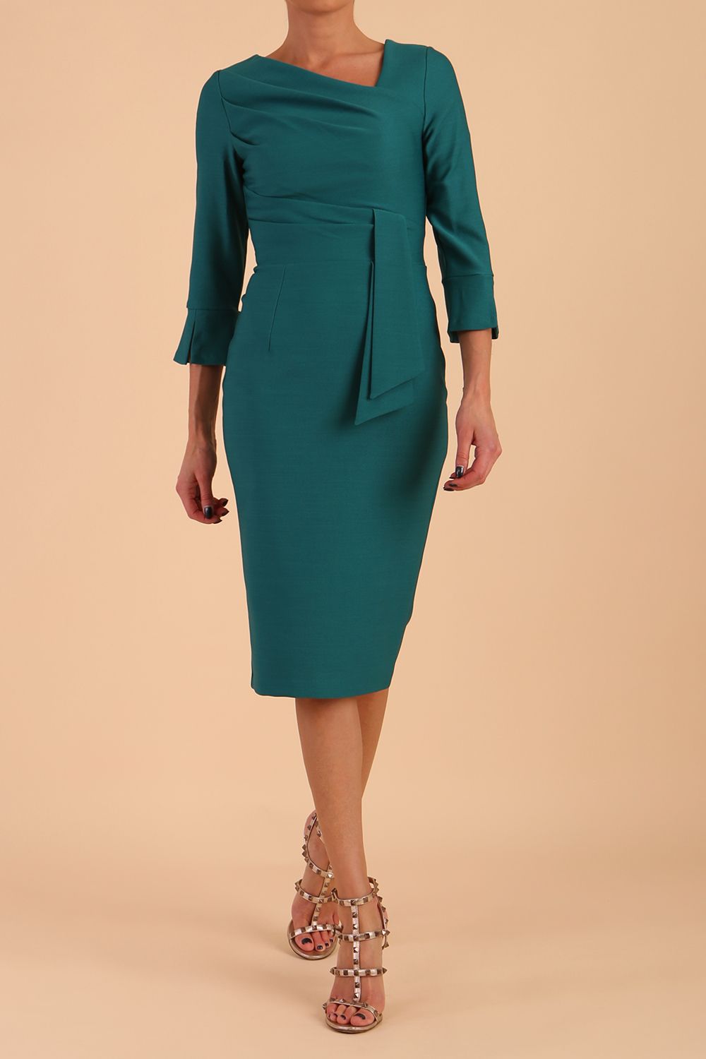 Model wearing diva catwalk Seed Orla Asymmetric Pencil Dress in Pacific Green front side