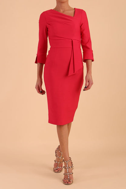 Model wearing diva catwalk Seed Orla Asymmetric Pencil Dress in Opera Pink front side