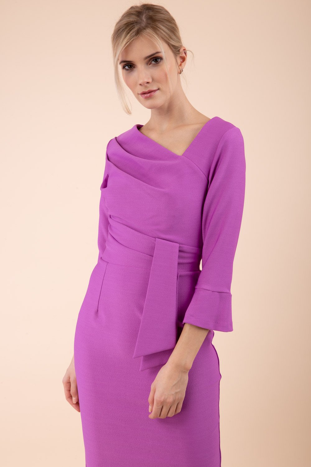 Model wearing diva catwalk Seed Orla Asymmetric Pencil Dress in Magenta Mist front side