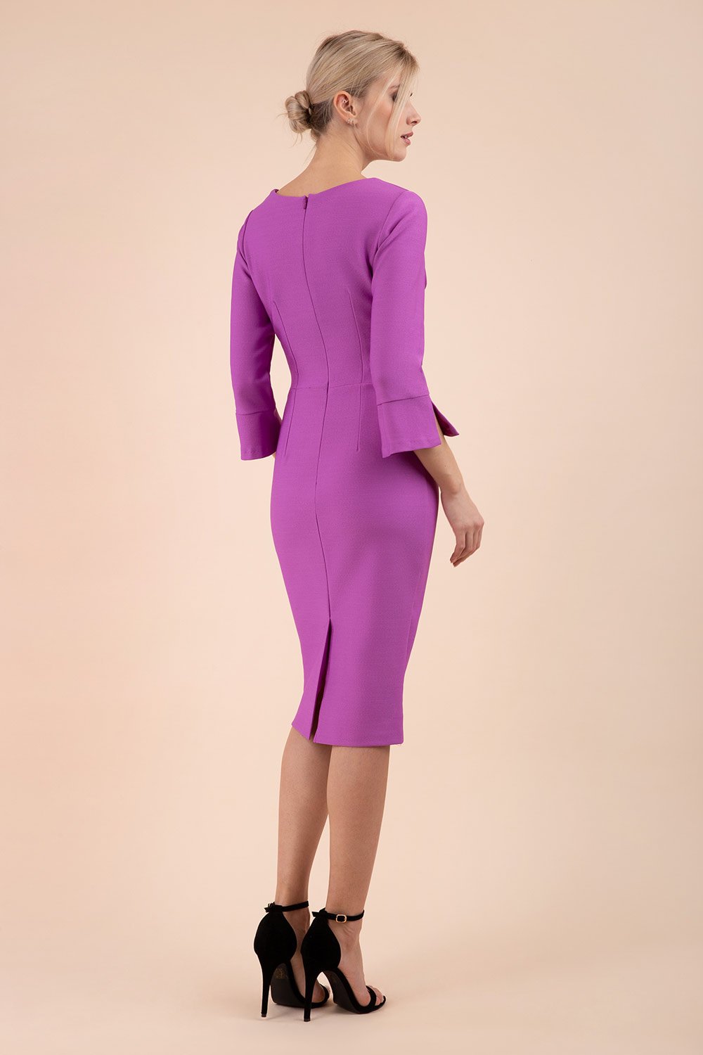 Model wearing diva catwalk Seed Orla Asymmetric Pencil Dress in Magenta Mist front side