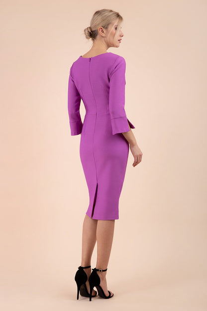 Model wearing diva catwalk Seed Orla Asymmetric Pencil Dress in Magenta Mist front side