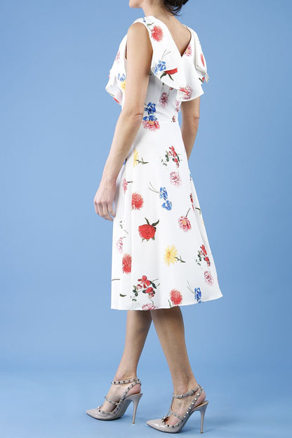 model is wearing diva catwalk layla a-line swing printed dress without sleeves in buttercup print front