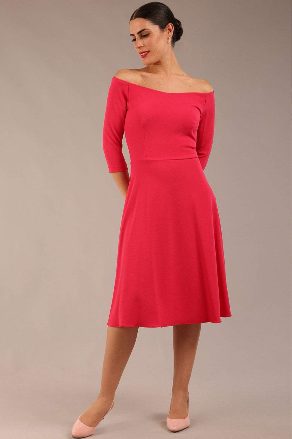 brunette model is wearing diva catwalk off shoulder swing a-line islay dress with sleeves in honeysuckle pink colour front image 