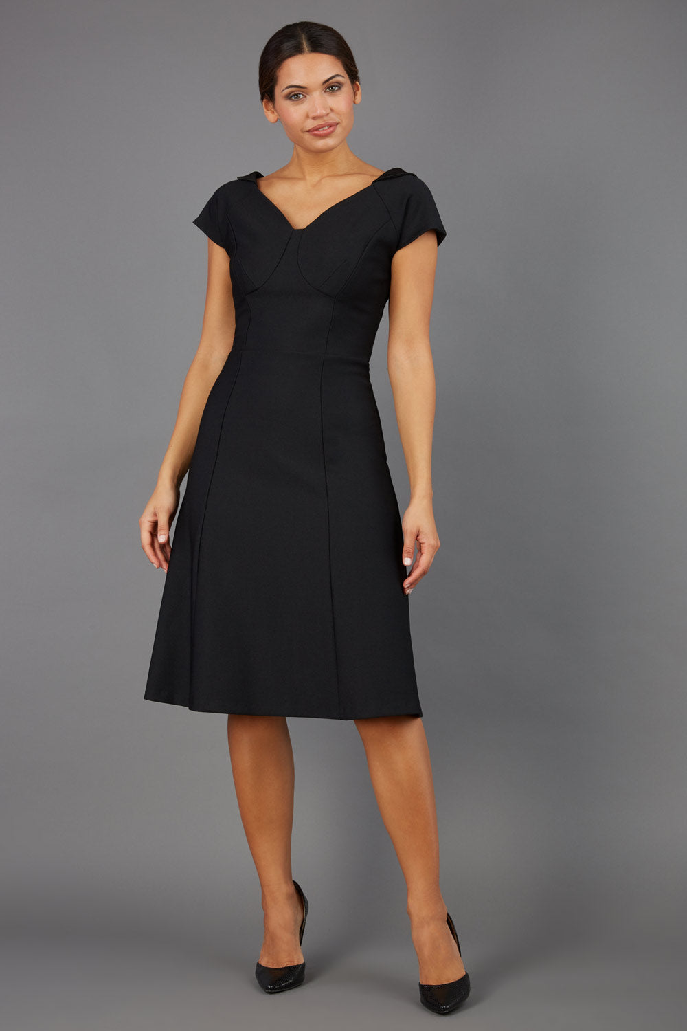 model wearing a diva catwalk Bowmore V-Neck A-line Dress cap sleeve in black colour