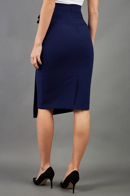 model is wearing diva catwalk antibe pencil asymmetric skirt with pleating at the front in navy front