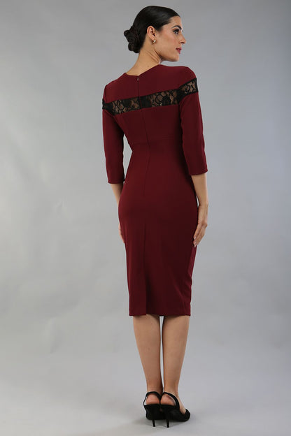 Model wearing the Diva Atlantis Pencil dress with three quarter length sleeves in cabaret burgundy and black front image